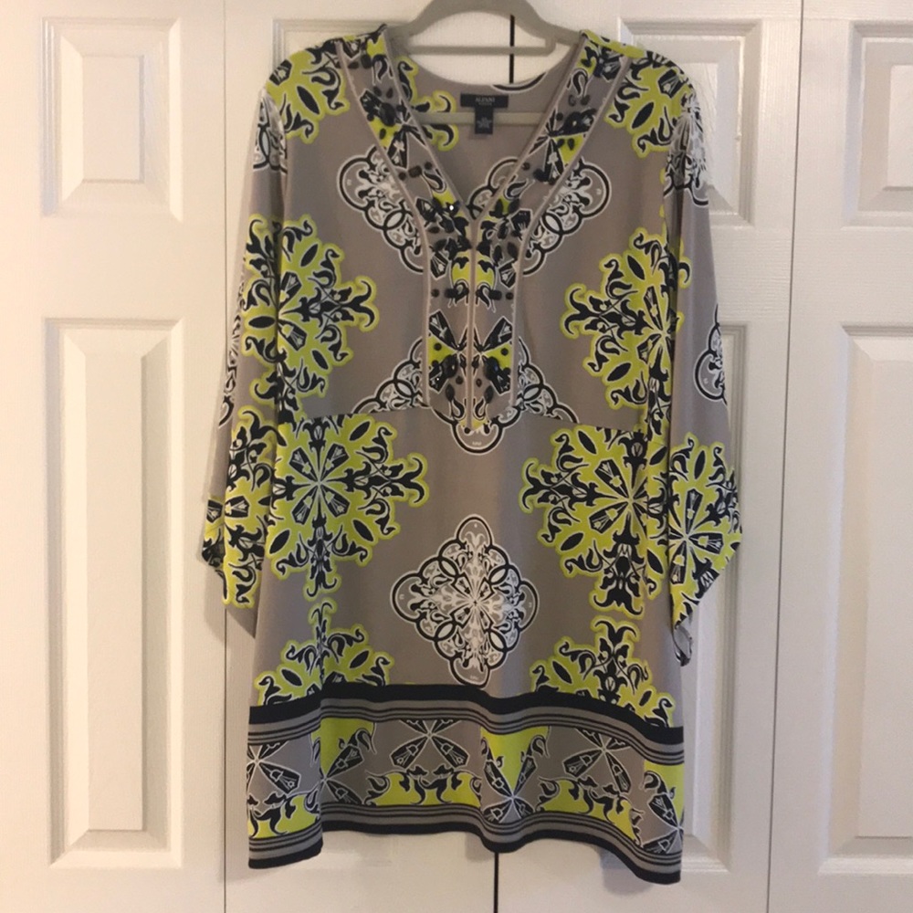 Tunic with encrusted neckline